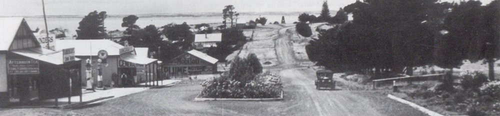 Cook St in 1926, with the store half way down the street.
